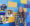 Collage of Hanna Eide that includes a photo of her wearing an SDSU football jersey infront of blue and yellow wall, a photo of her and her husband at an SDSU football game, a photo of her nursing headshot and a photo of her and her son, Baylen.