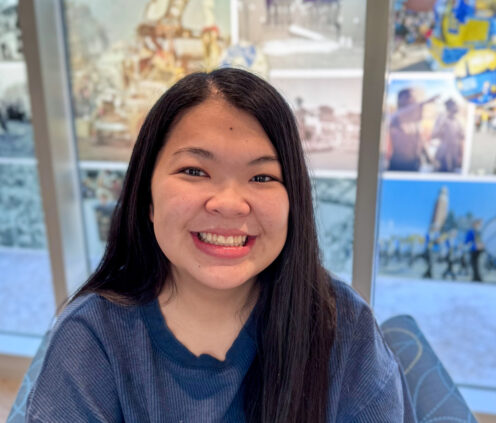 Photo of Hailey smiling in the SDSU Alumni Center