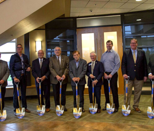 Group photo of people with shovels in their hands, taken at the groundbreaking of the POET Bioprocessing Institute. L to R: Dwaine Chapel, Jeff Lautt, Jim Rankin, Barry Dunn, David Salem, Daniel Scholl, Kevin Tetzlaff, Jeff Partridge, Ralph Davis