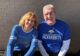 Elaine and Jerome Garry smiling together, wearing Jackrabbit gear