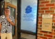 Lucas Wintrode standing in front of the Lucas P. Wintrode Autism Support Services Office.