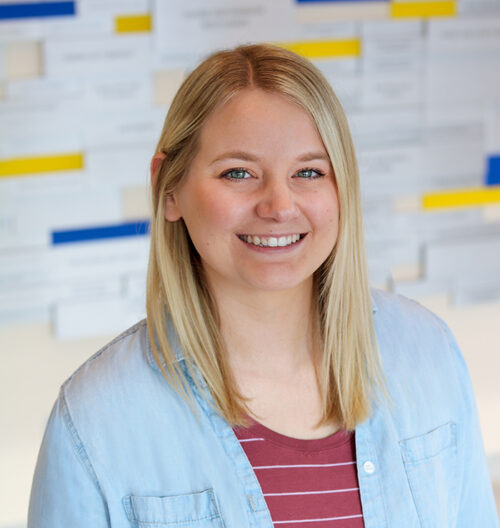 Professional headshot photo of Karley Monson with a blurred background.