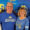 Jerome and Elaine Garry smiling wearing Jackrabbit gear, with a Jackrabbit-theme photo backdrop