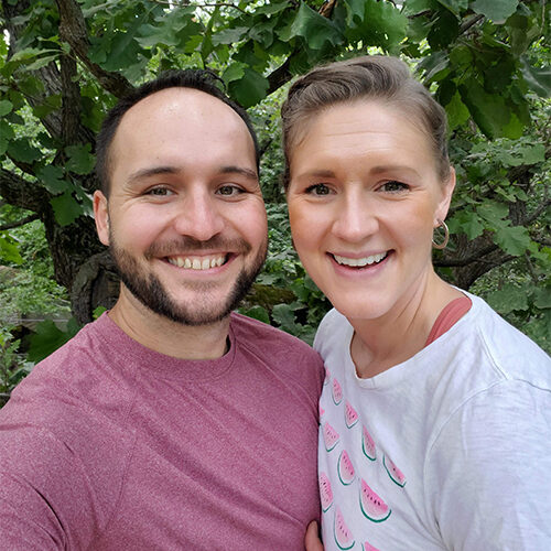 Rachel smiles with her husband