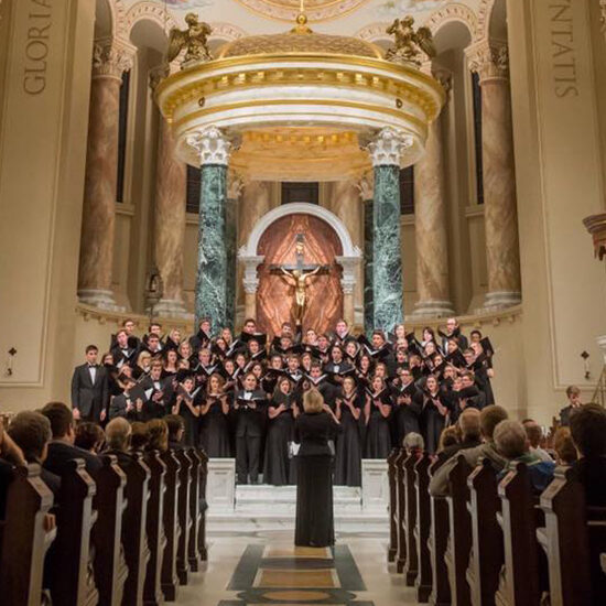 Dr. Diddle directs the choir in a beautiful cathedral.